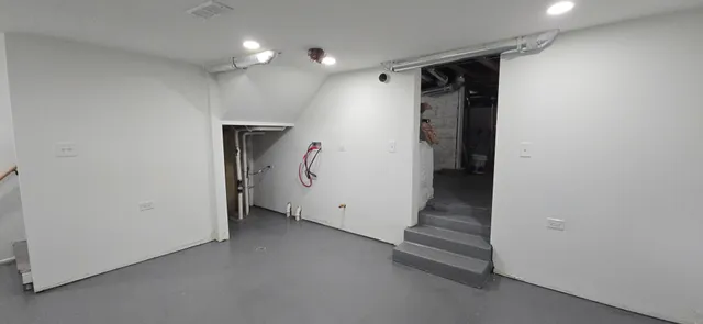 a view of a back yard of the house