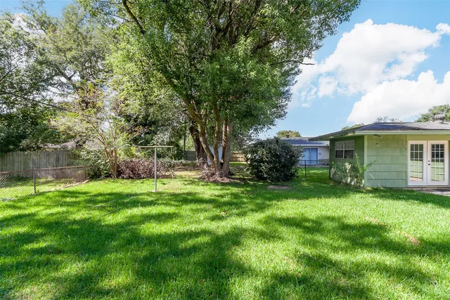 a view of a backyard with a garden