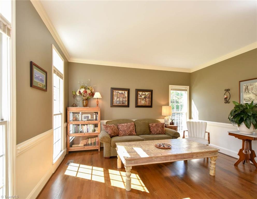 3817 Pinetop Road Greensboro, NC 27410 - Photo 5 of 29 Morning sun floods this beautiful living room just off the foyer.