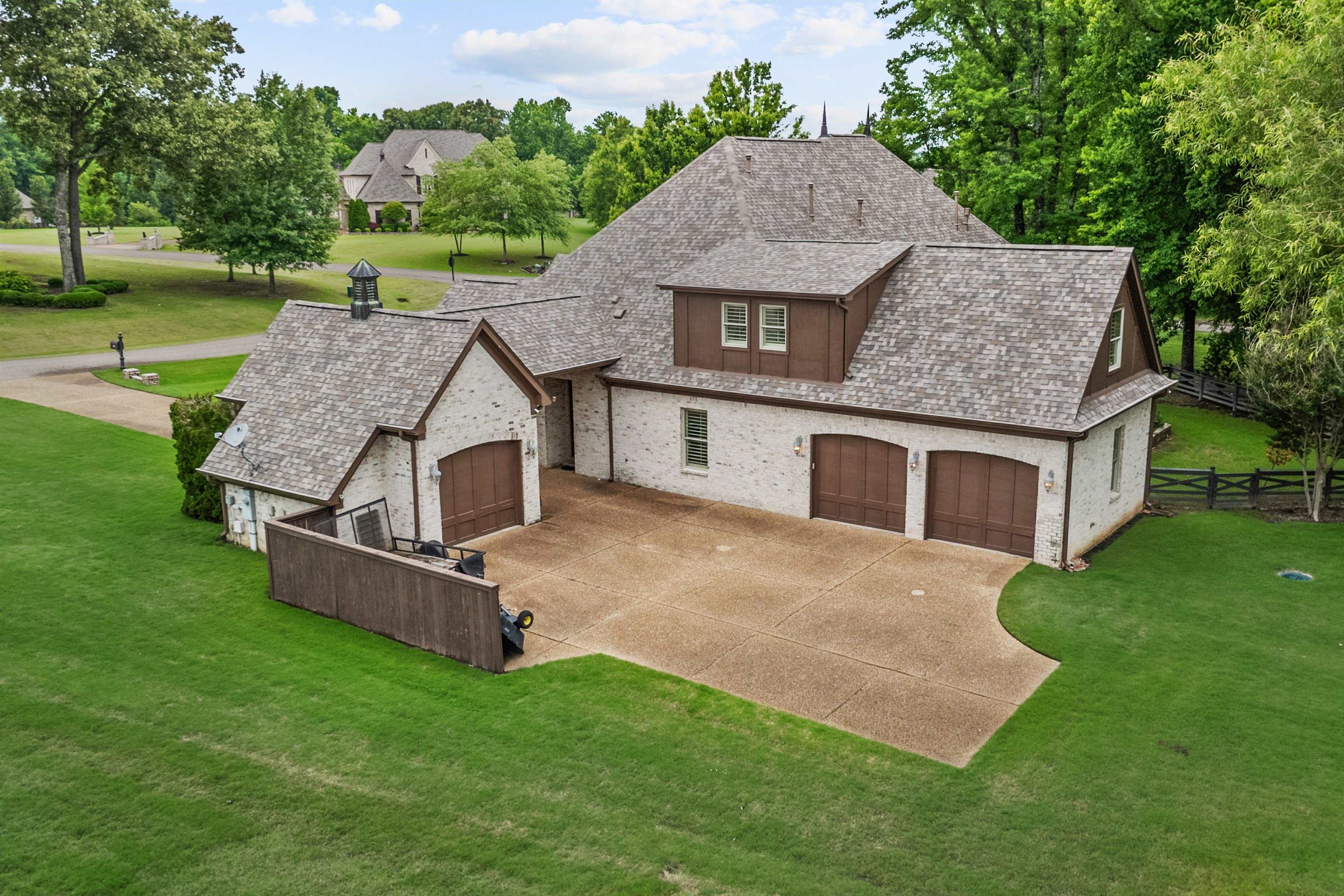 150 Ridgecrest Drive Arlington, TN 38002 - Photo 36 of 40 Brick exterior with multiple gables and dormers