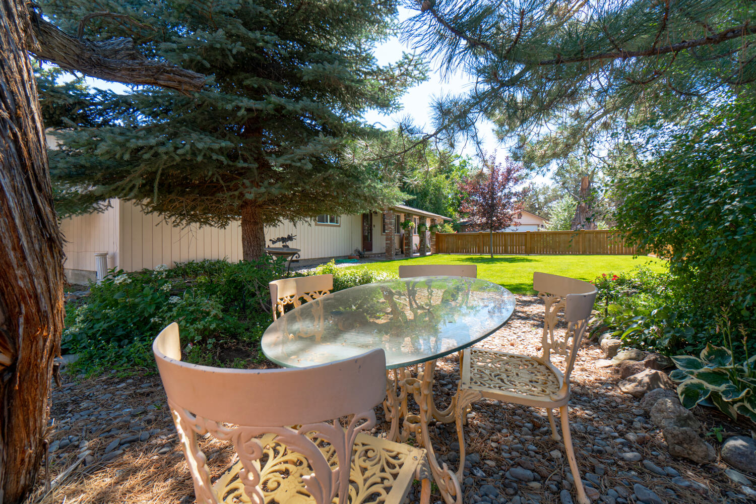 2218 Southwest 79th Street Redmond, OR 97756 - Photo 36 of 54 a view of a swimming pool with a patio and plants