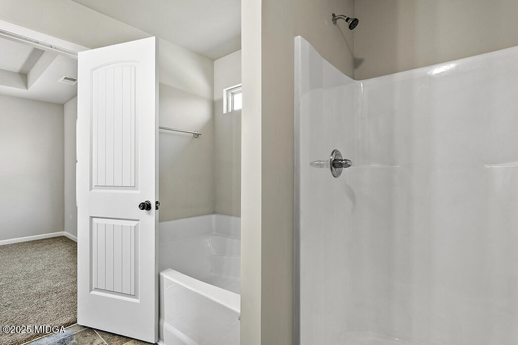 306 Mill Meadow Road Macon, GA 31216 - Photo 21 of 29 a bathroom with a shower