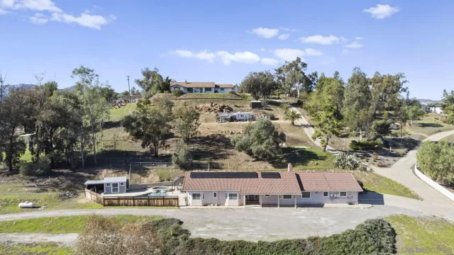 a view of a city with mountains in the background
