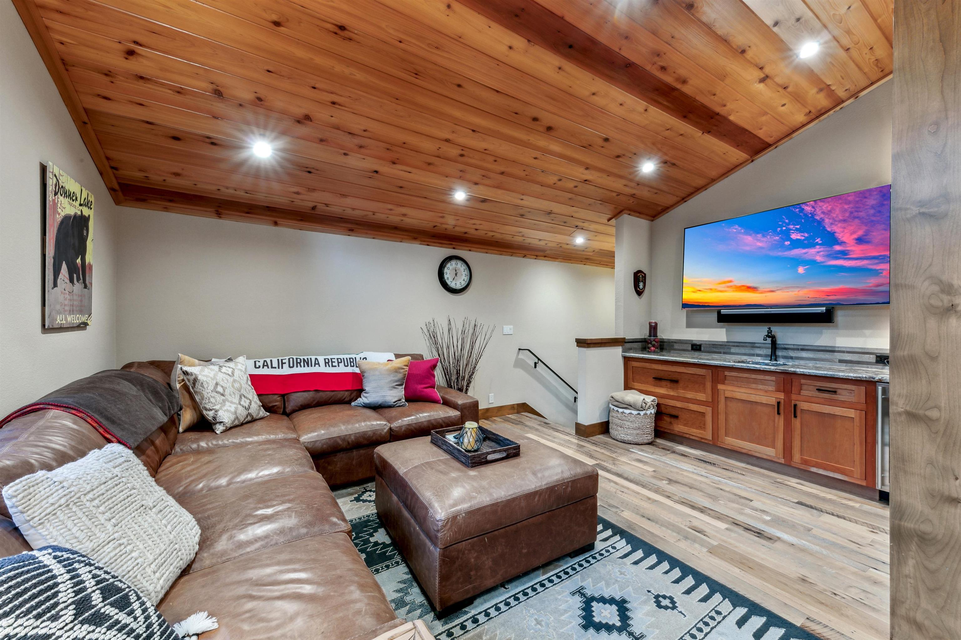 14204 Ski View Loop Truckee, CA 96161 - Photo 13 of 28 a living room with furniture and a flat screen tv