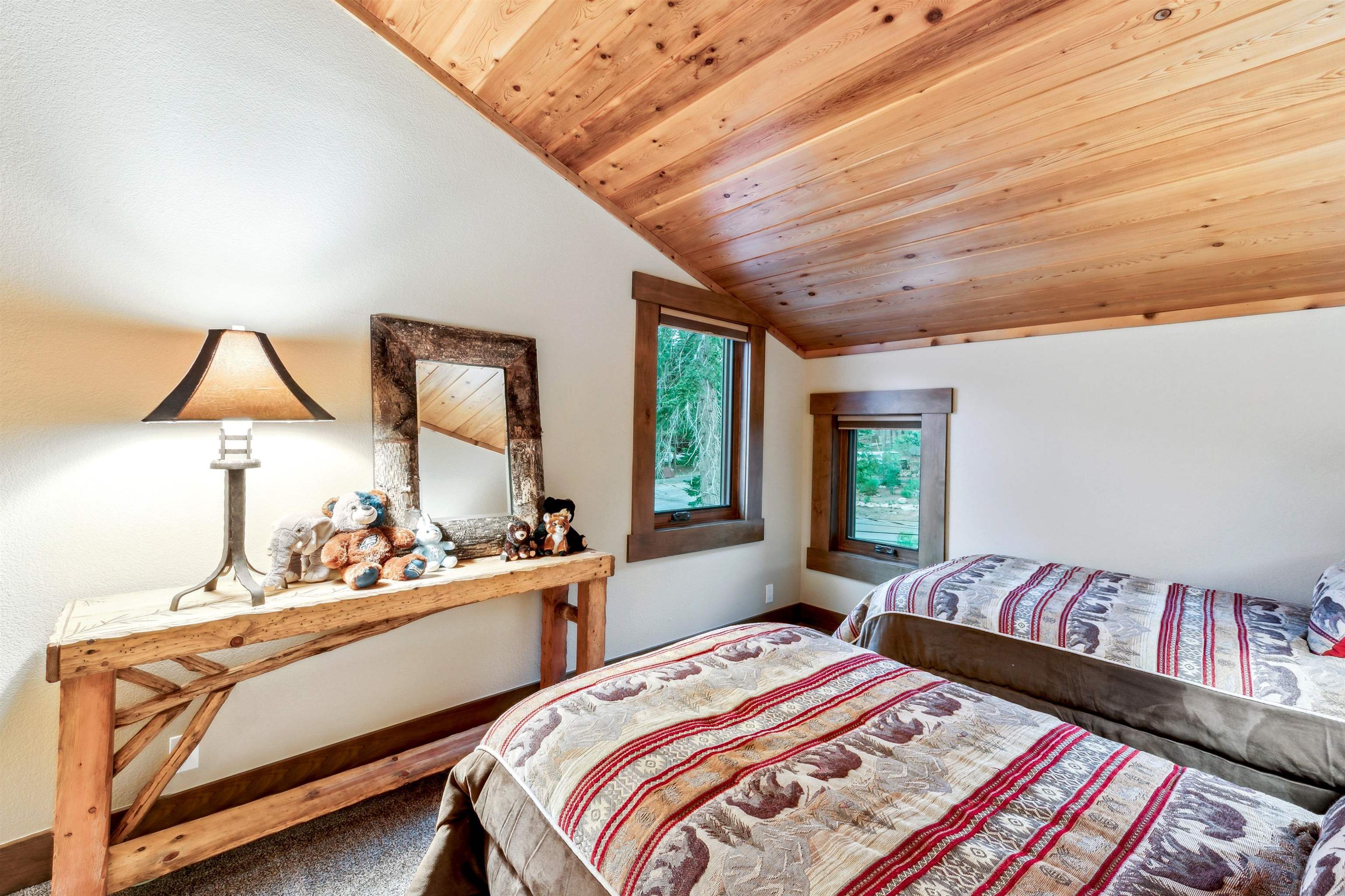 14204 Ski View Loop Truckee, CA 96161 - Photo 21 of 28 a bedroom with furniture and a large window