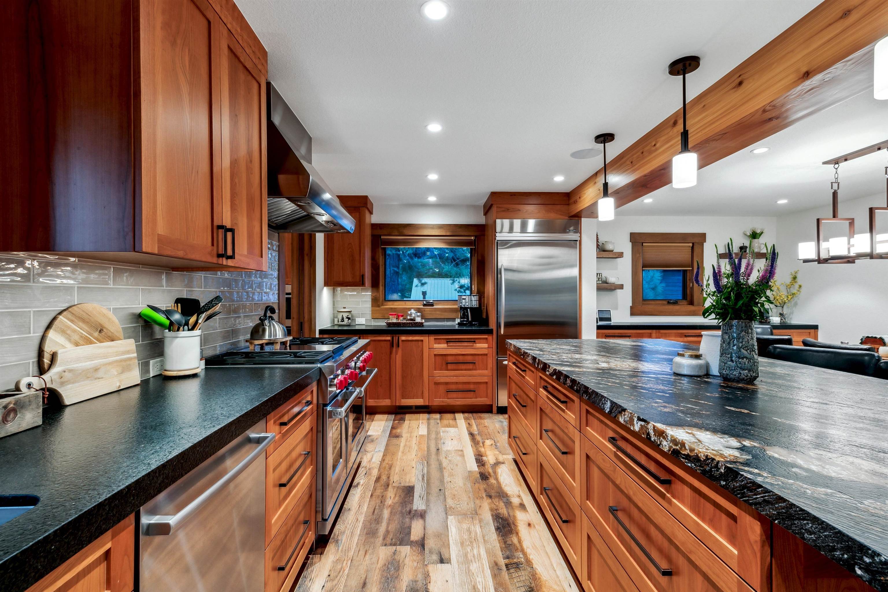 14204 Ski View Loop Truckee, CA 96161 - Photo 8 of 28 a kitchen with lots of counter top space and wooden floor