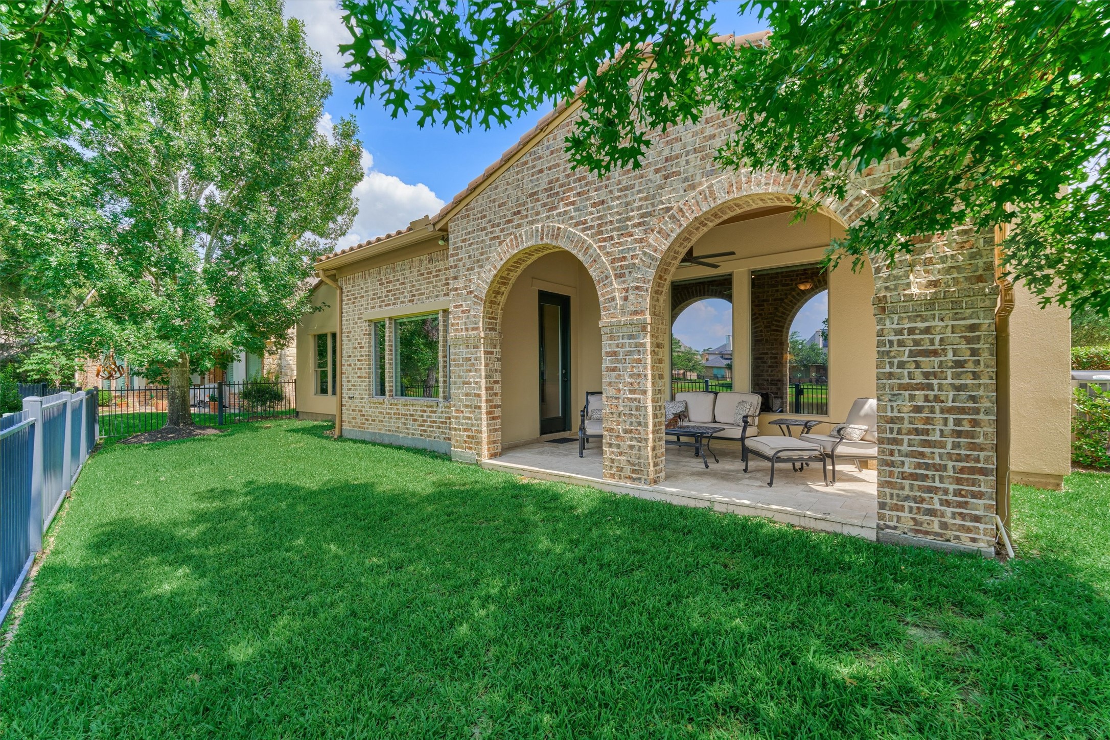 82 East Crystal Canyon Circle The Woodlands, TX 77389 - Photo 39 of 50 Mature trees provide ample backyard shade and a beautiful natural setting.