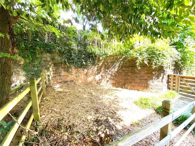 a view of a yard with an outdoor space