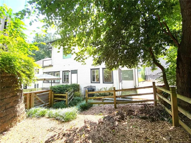 a house view with sitting space and garden space