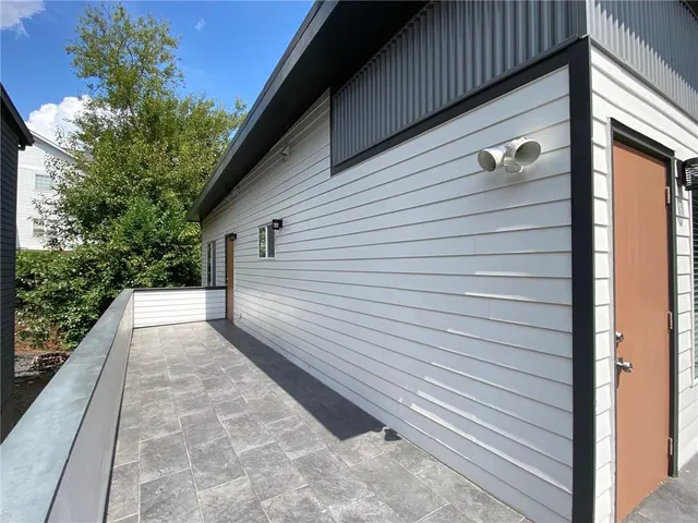 a view of a back yard of the house