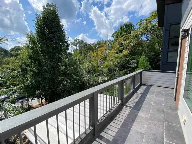 a view of a house with a large window