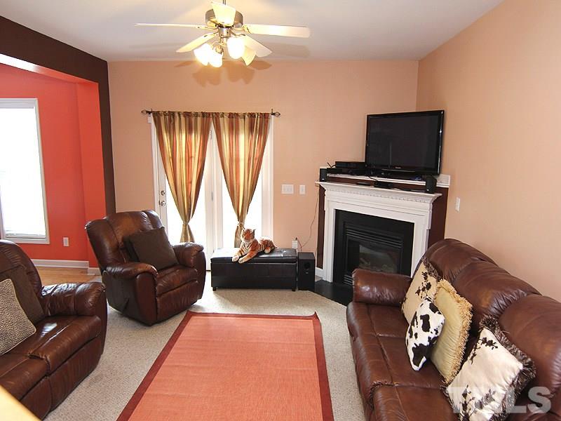 8525 Tierra Del Sol Way Raleigh, NC 27616 - Photo 2 of 12 Family Room and Fireplace