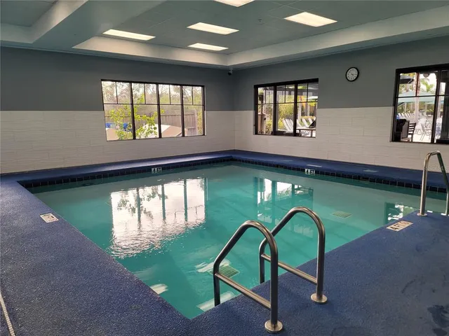 a view of a swimming pool with window