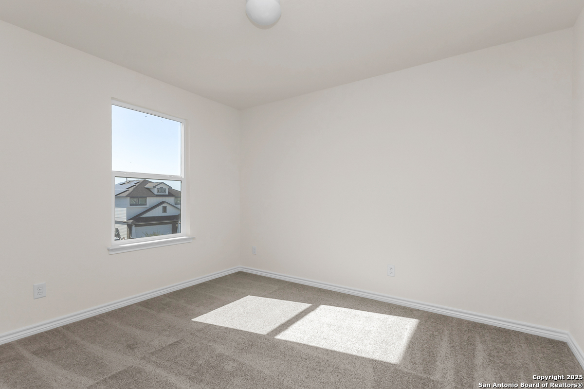 9515 Griffith Run Converse, TX 78109 - Photo 11 of 18 an empty room with a window