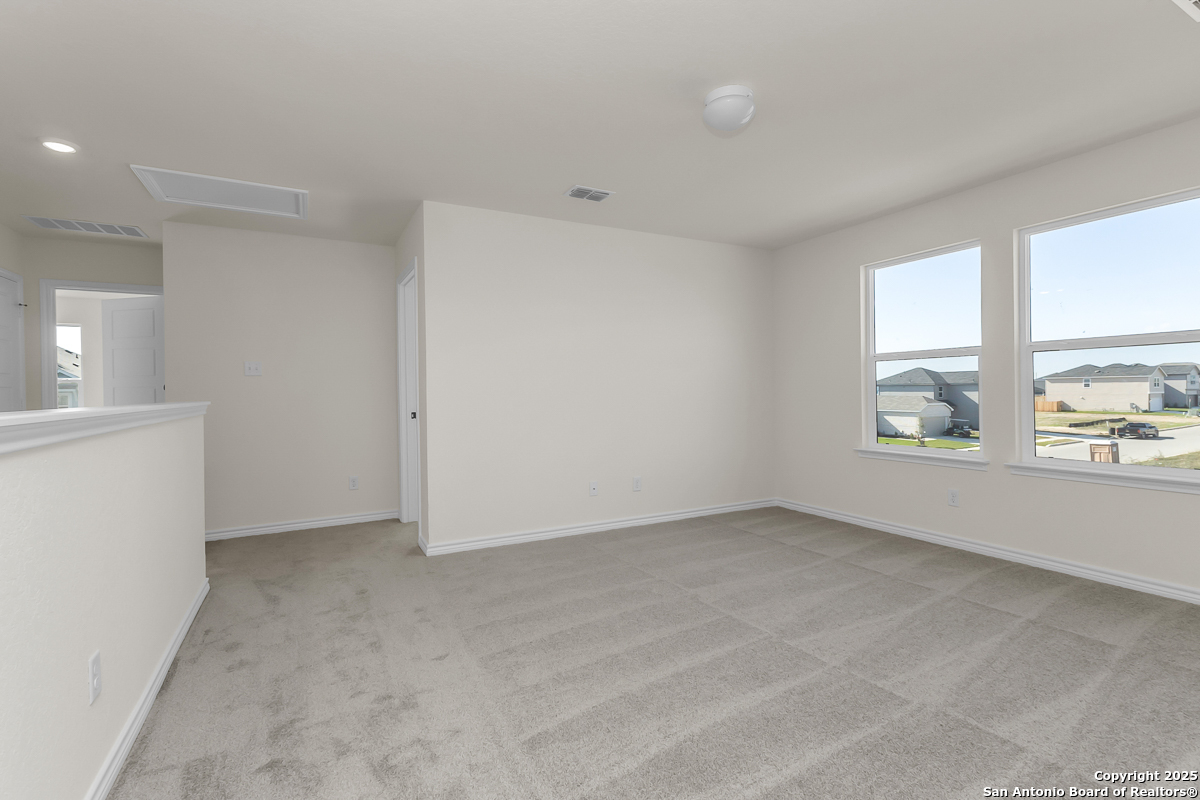 9515 Griffith Run Converse, TX 78109 - Photo 7 of 18 an empty room with windows