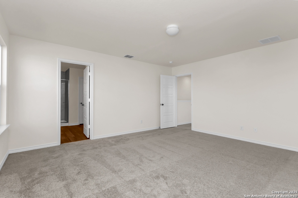 9515 Griffith Run Converse, TX 78109 - Photo 9 of 18 a view of an empty room and wooden floor