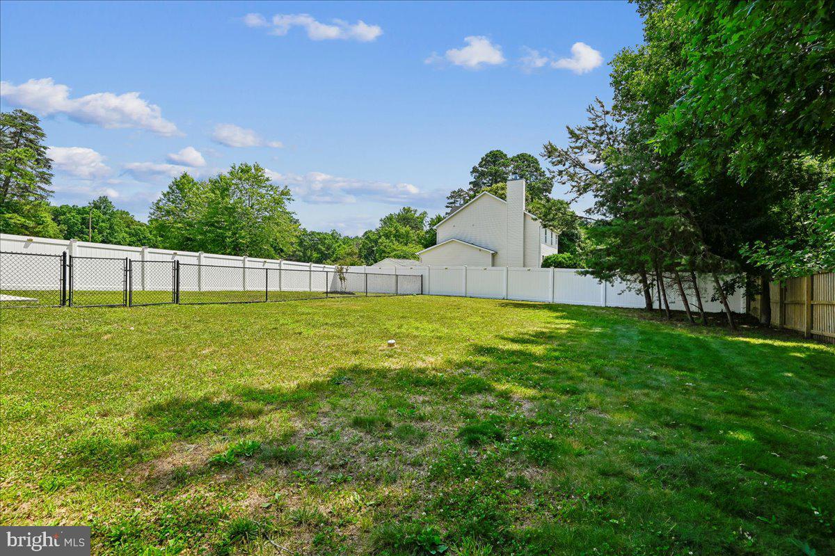 603 Queenstown Road Severn, MD 21144 - Photo 69 of 85 Spacious backyard with serene views.