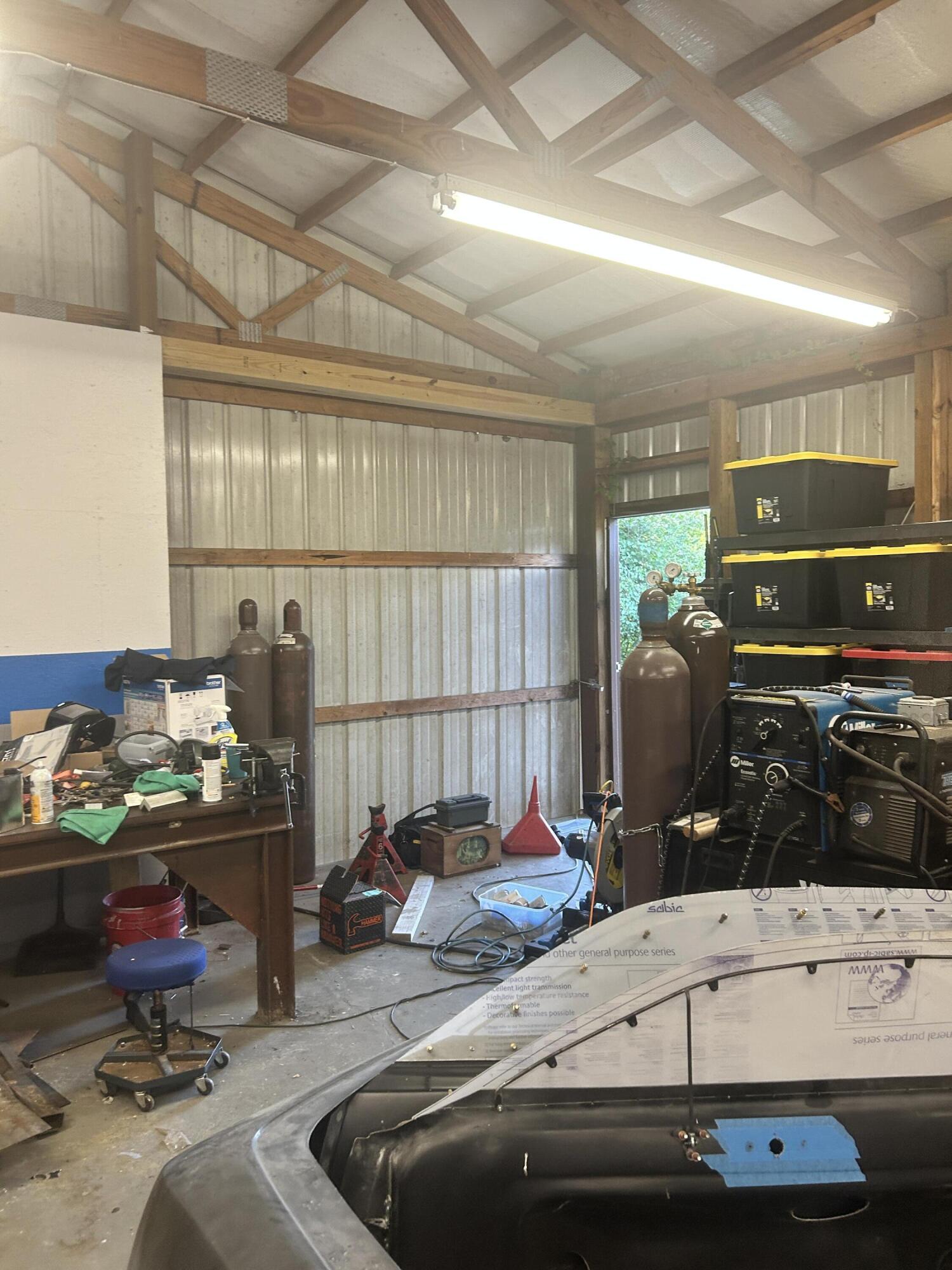 726 Old Brown Road Salvisa, KY 40372 - Photo 70 of 89 Garage big door, and walk thru door photo