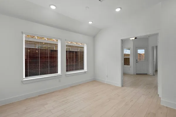 an empty room with windows