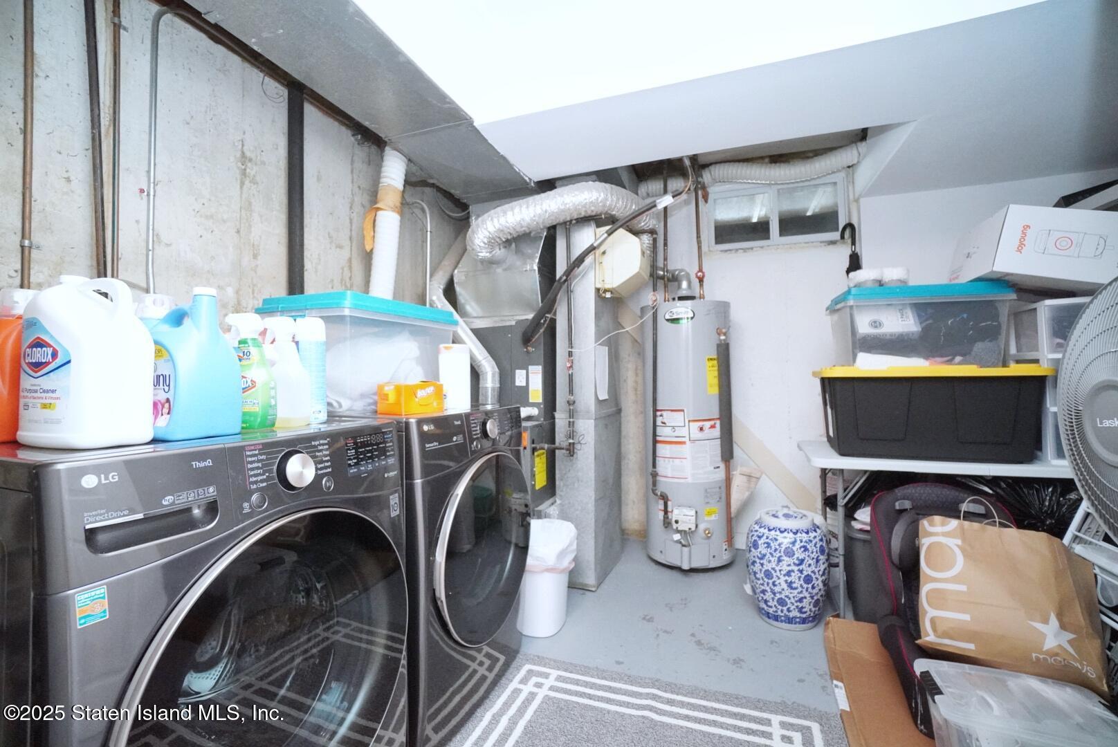 168 Rosedale Avenue Staten Island, NY 10312 - Photo 18 of 21 a utility room with refrigerator and washer