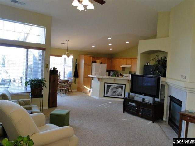 1885 San Pablo Drive Reno, NV 89521 - Photo 4 of 8 a living room with furniture and a flat screen tv