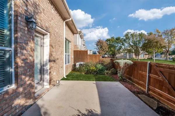 a view of a pathway with a backyard