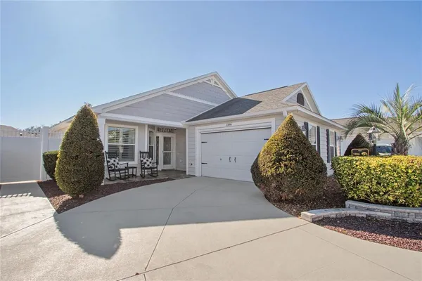 a view of a house with tub and chairs