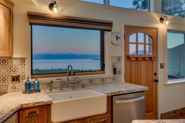 a bathroom with a sink a vanity and a mirror