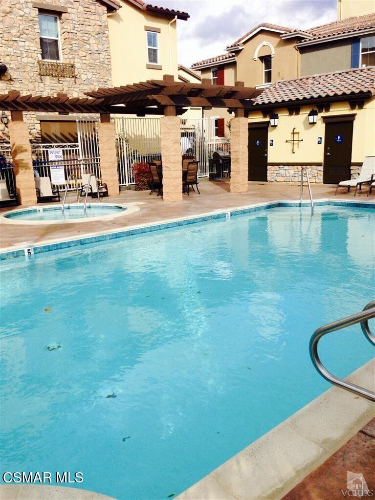 2234 Rolling River Lane, Unit 3 Simi Valley, CA 93063 - Photo 13 of 13 a front view of a building with an outdoor space