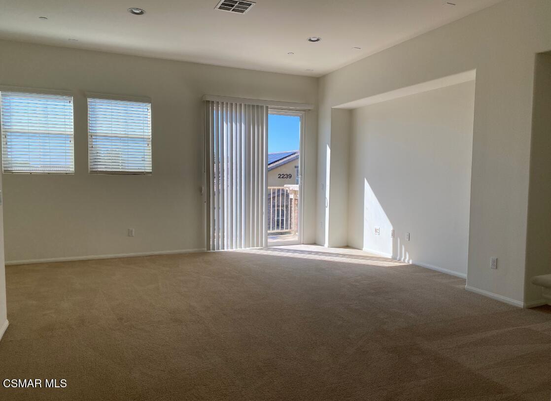 2234 Rolling River Lane, Unit 3 Simi Valley, CA 93063 - Photo 10 of 13 a view of an empty room with a window