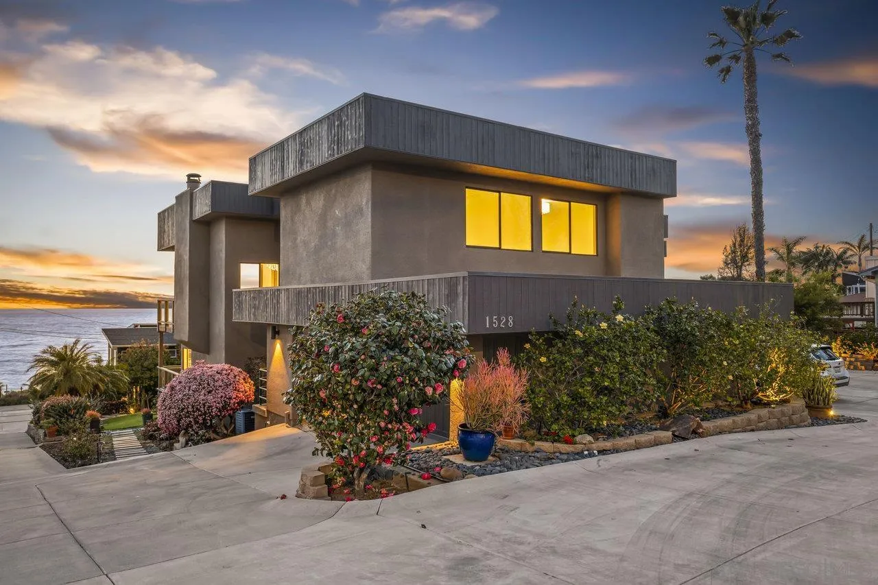 a front view of a house having yard