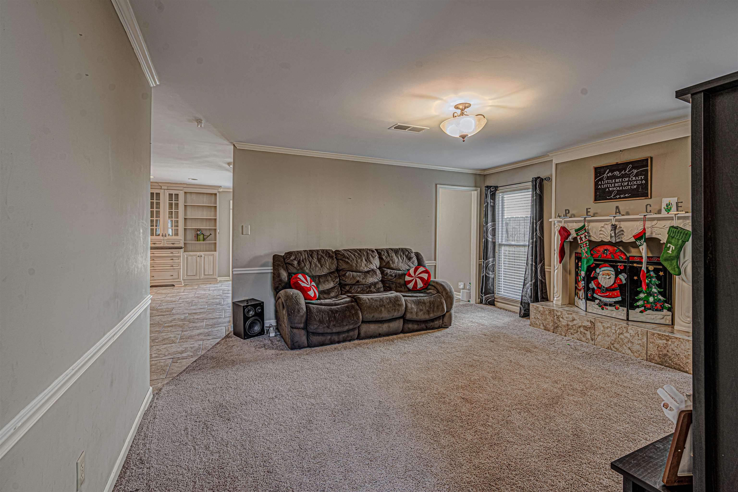 765 Pine Grove Cove Collierville, TN 38017 - Photo 12 of 31 a view of a livingroom with furniture and a chandelier