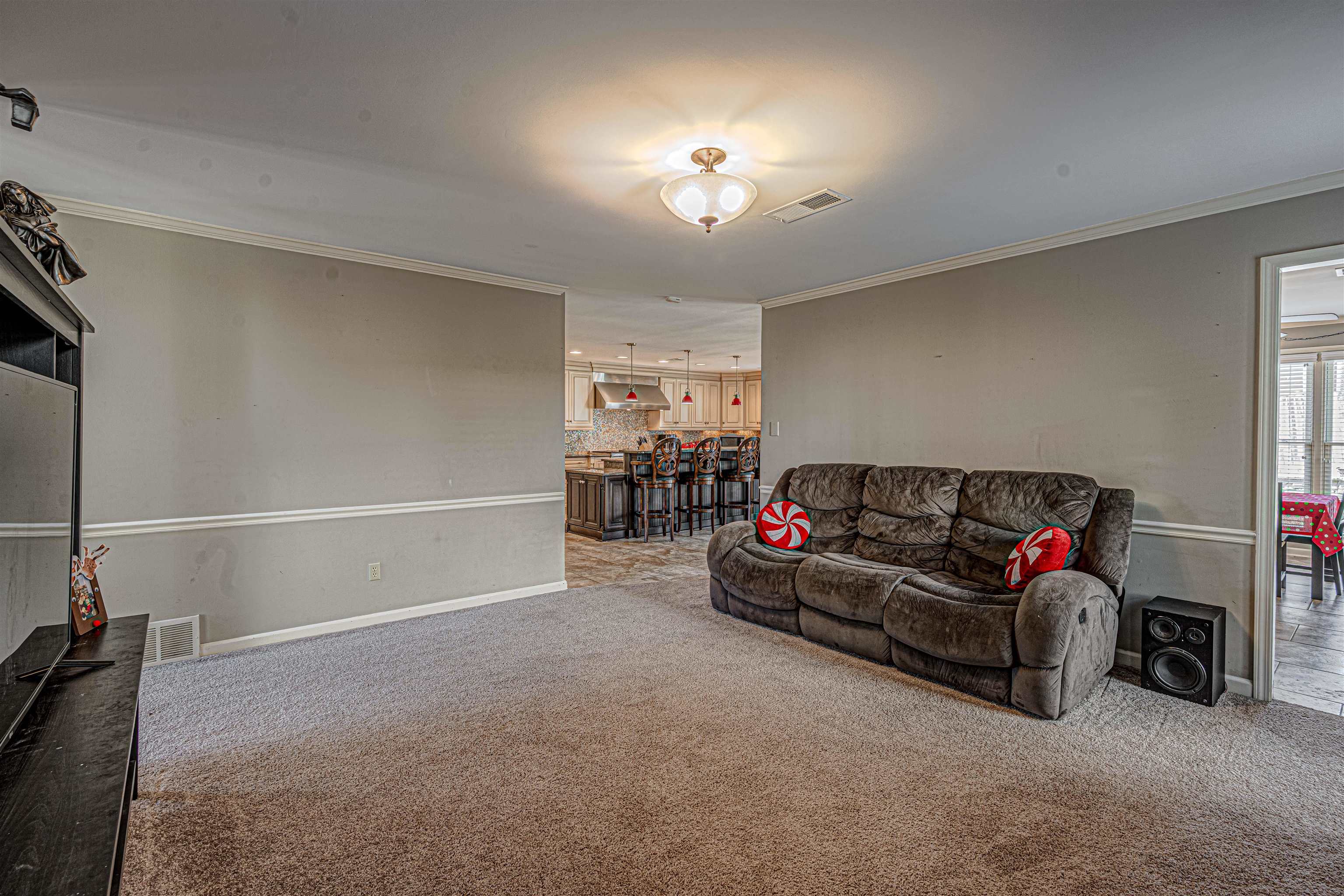 765 Pine Grove Cove Collierville, TN 38017 - Photo 14 of 31 a living room with furniture and a ceiling fan