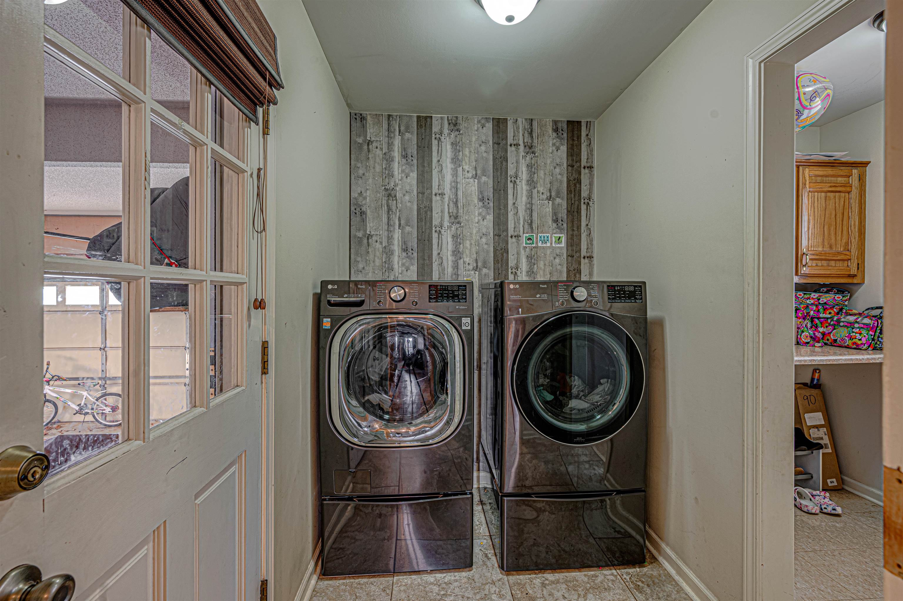 765 Pine Grove Cove Collierville, TN 38017 - Photo 16 of 31 a utility room with dryer and washer
