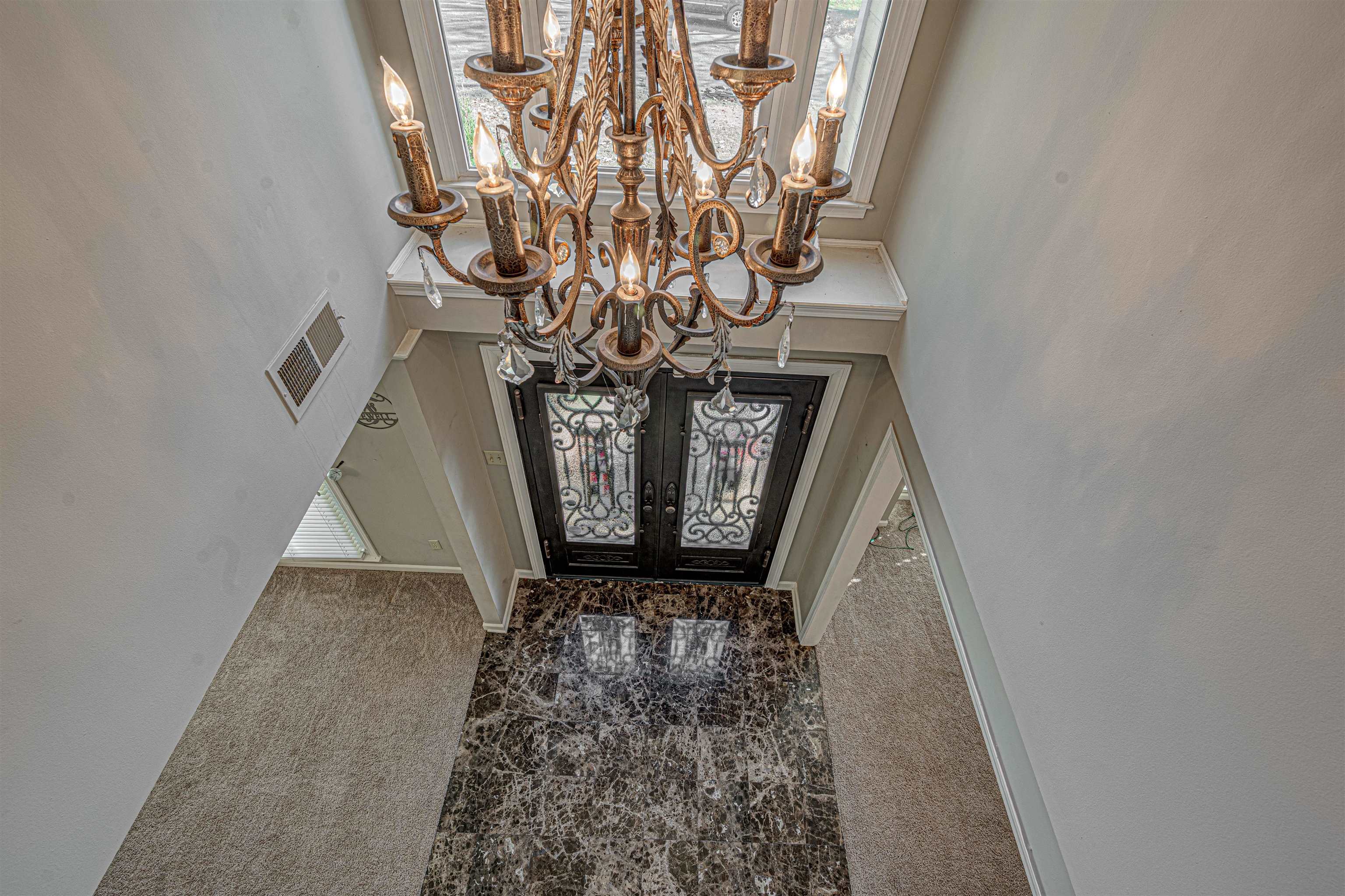 765 Pine Grove Cove Collierville, TN 38017 - Photo 4 of 31 a vase with flowers sitting on a floor