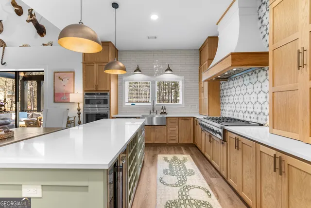 a bathroom with a tub a sink and a mirror