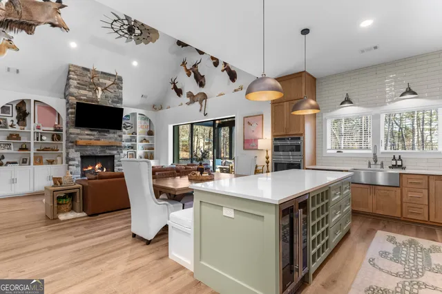 a bedroom with a large bed and a couch