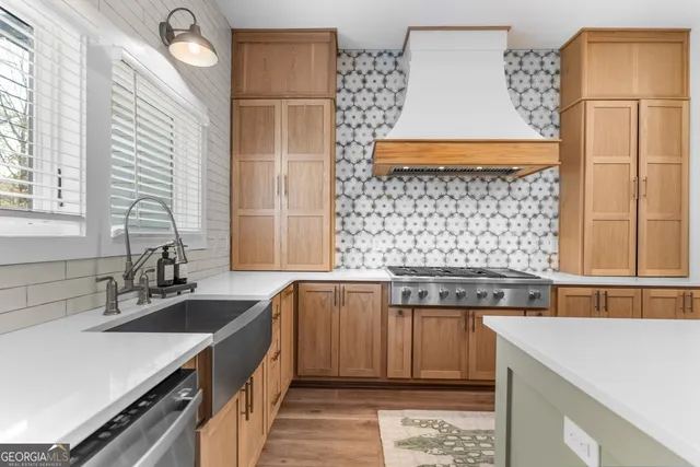 a bathroom with a sink a mirror and vanity