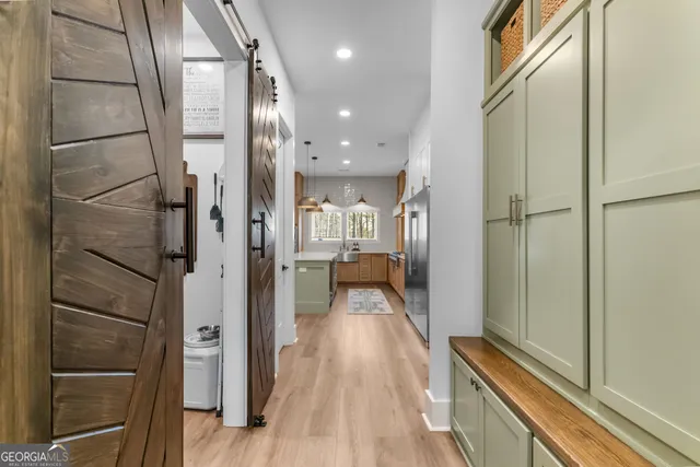 a living room with furniture or couch and a flat screen tv