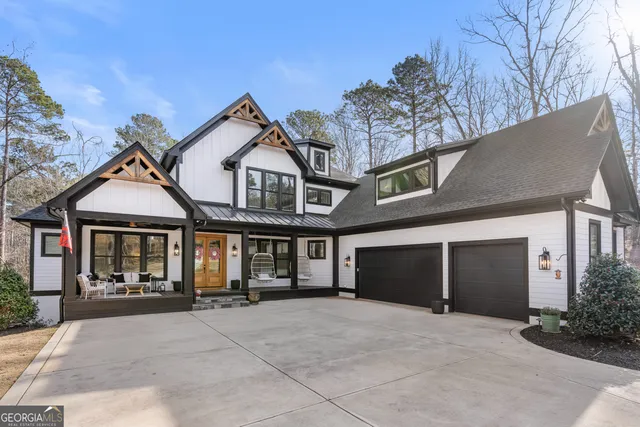 a front view of a house with entrance gate