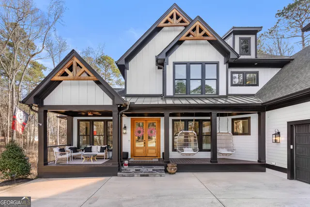 a aerial view of a house with a small yard