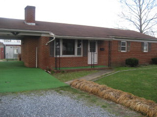 2178 West Dry River Road Dayton, VA 22821 - Photo 1 of 1 a front view of a house with a garden