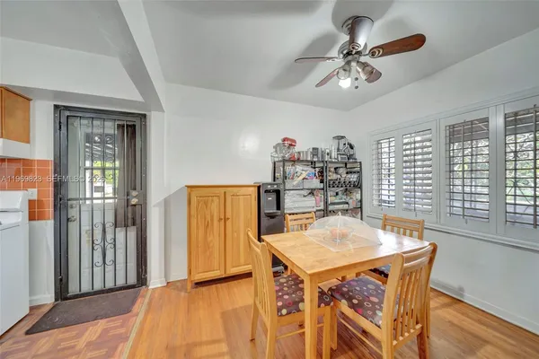 a view of a kitchen and dining room