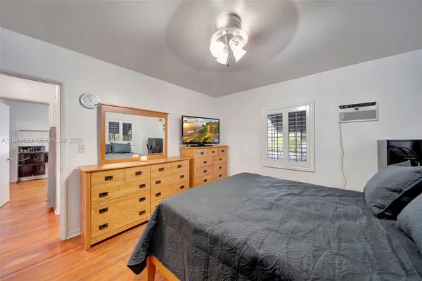 a view of a livingroom with furniture and wooden floor