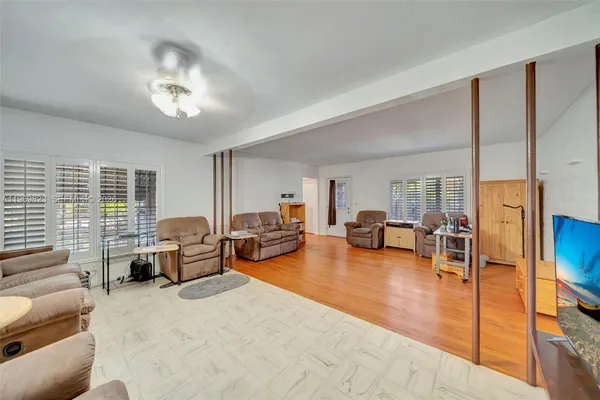 a living room with furniture and a couch