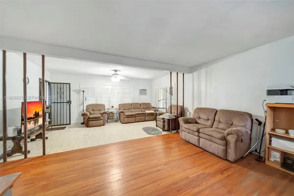 a kitchen with cabinets a sink and appliances