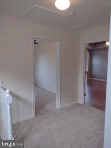 a bathroom with a sink and shower