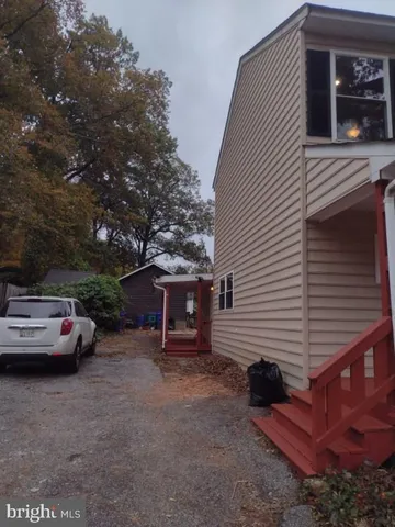 a view of street with parked cars