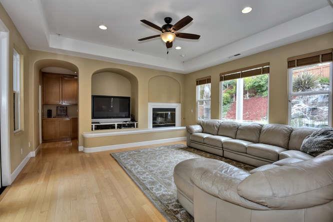 2820 Club Drive Gilroy, CA 95020 - Photo 13 of 43 a living room with furniture and a fireplace