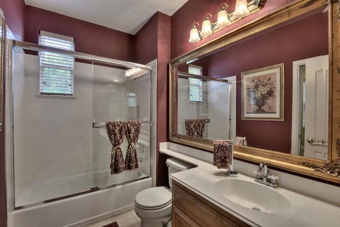 2820 Club Drive Gilroy, CA 95020 - Photo 17 of 43 a bathroom with a sink a toilet and shower